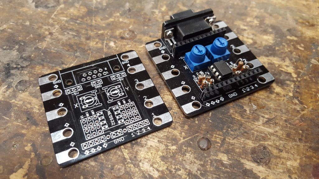 Unpopulated and populated interface board.